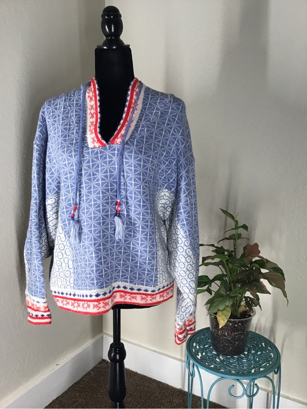 This is an Anthropologie Pilcro Abstract Pullover Hoodie Sweater. Bohemian-style